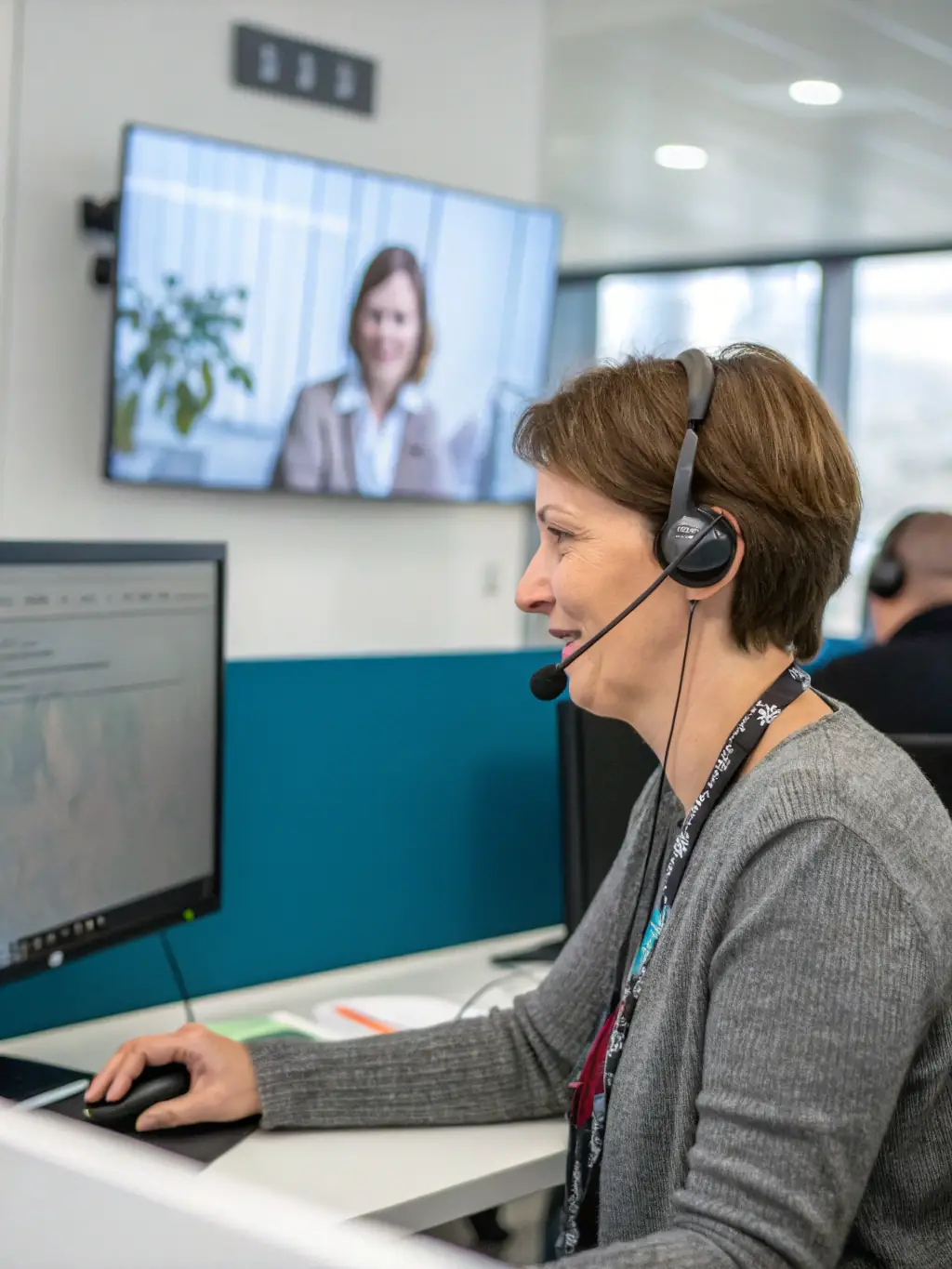 An image depicting a customer service representative assisting a client via video call, showcasing personalized support.